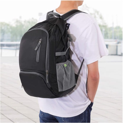 Teal Simba folding ultralight portable laptop and sport backpack with adjustable straps and compact design for outdoor activities.