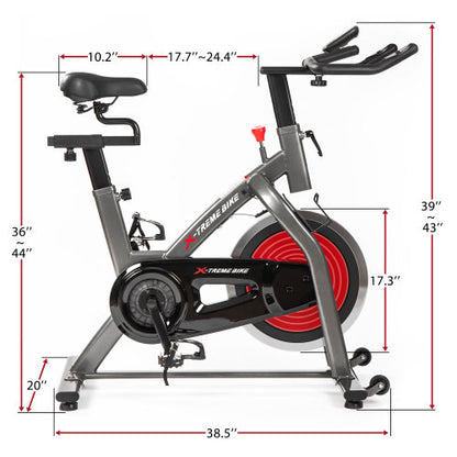 Teal Simba indoor cycling bike with 4-way adjustable handlebar and seat, LCD monitor, showing the bike&