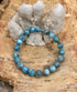 Blue Apatite stretch bracelet made of natural gemstones with round beads, designed for a comfortable fit and elegant style.