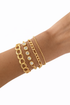 Set of four layered white stone bracelets by Ochre Juniper, adjustable elegant jewelry with minimalist design.
