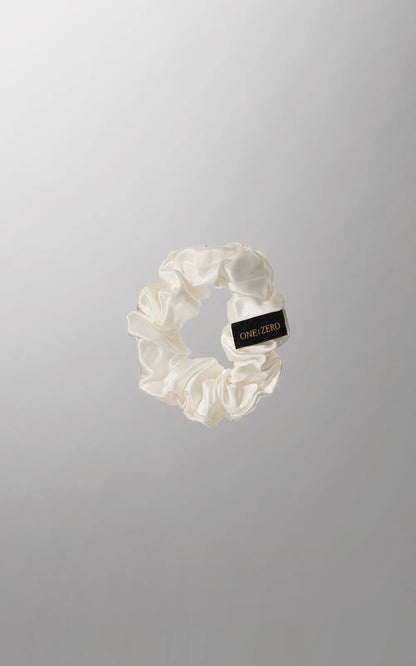 Set of Burgundy Clover silk hair ties in gray, golden, and white in medium and large sizes, perfect for hair accessories.