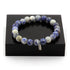 Tan Coconut Sodalite and Howlite bracelet with 8 mm beads, featuring blue and white stone beads on an elastic cord.