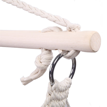 Lilac Milo hanging rope sky chair swing for home and garden, featuring a cozy outdoor seating design with sturdy ropes and a supportive seat.
