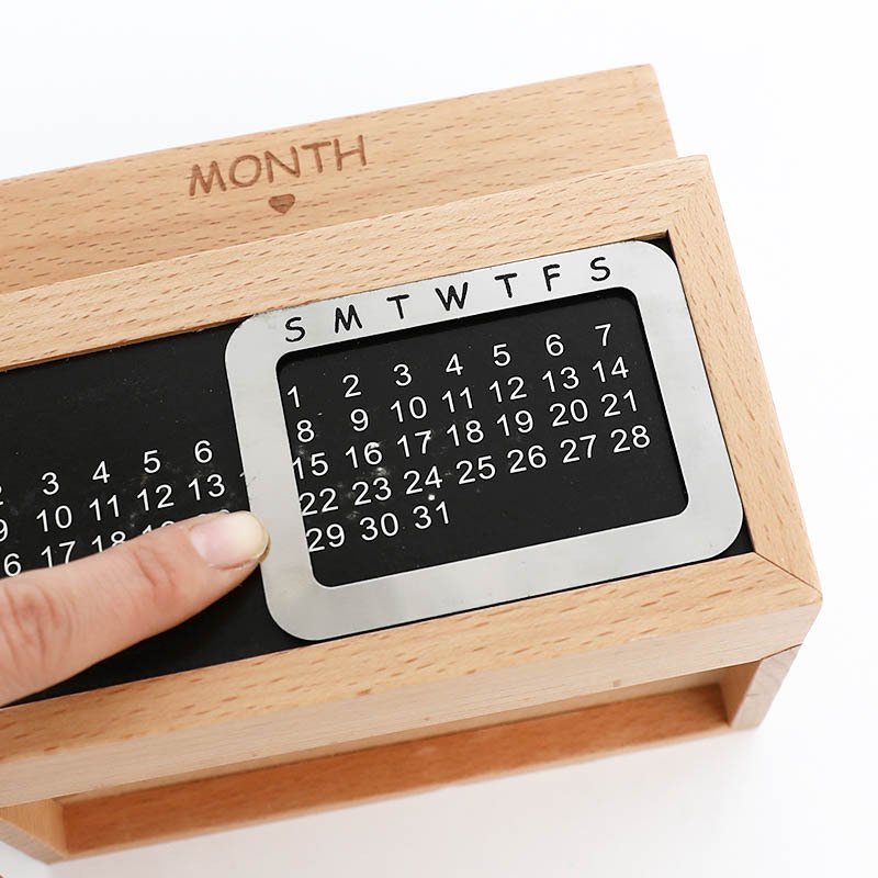 Fuchsia Molly desktop calendar storage box for home organization, featuring a compact design with compartments for stationery and accessories.