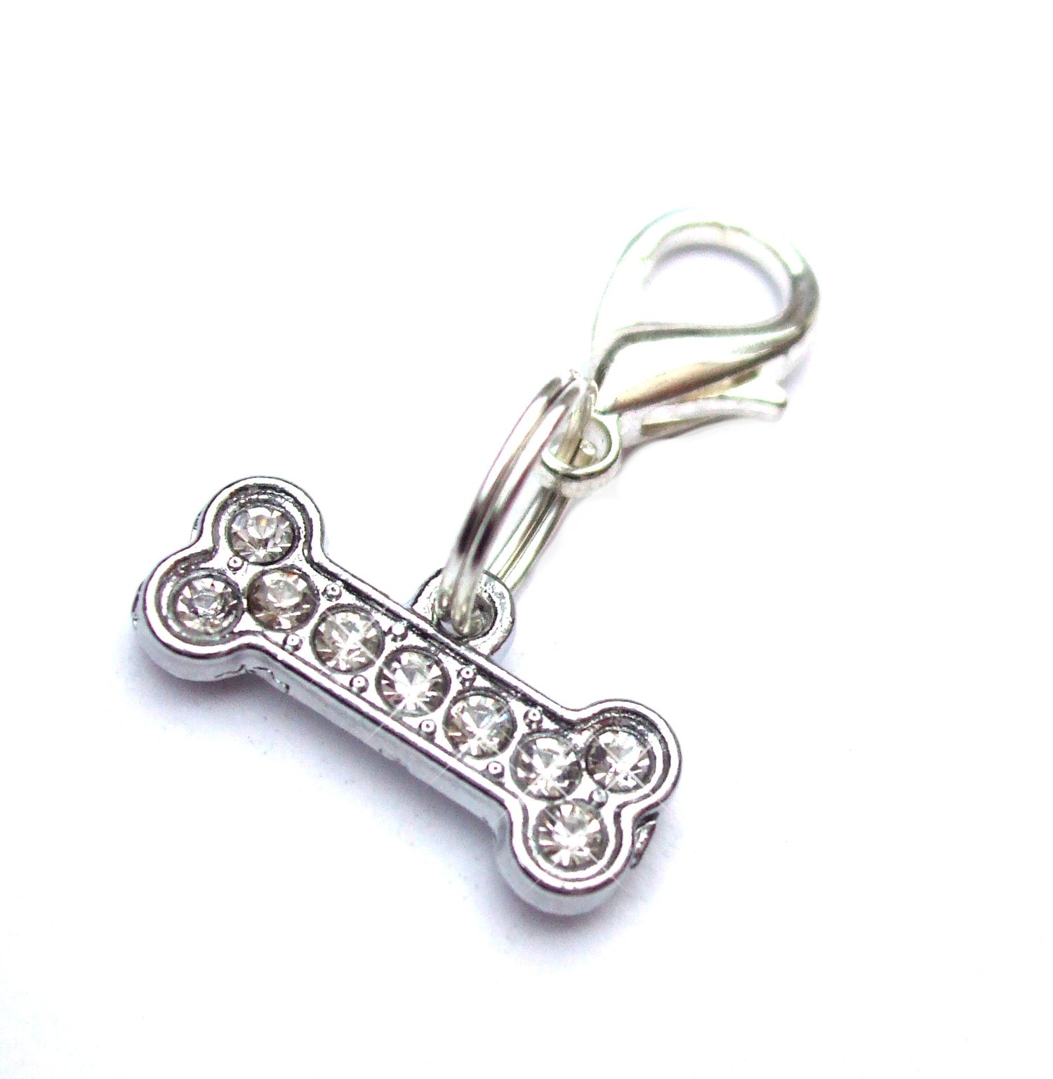 Salmon Oscar small bone pendant charm for pet collars and leashes, featuring a cute bone design in silver tone.