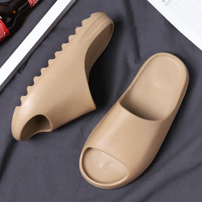 Brown and khaki Yeezy-inspired slides by Silver Juneberry, comfortable slippers with a stylish, casual design.