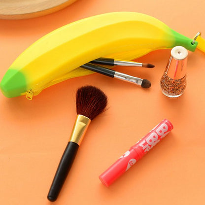 Fuchsia Molly banana design wallet with vibrant yellow banana print and compact leather wallet style for everyday use