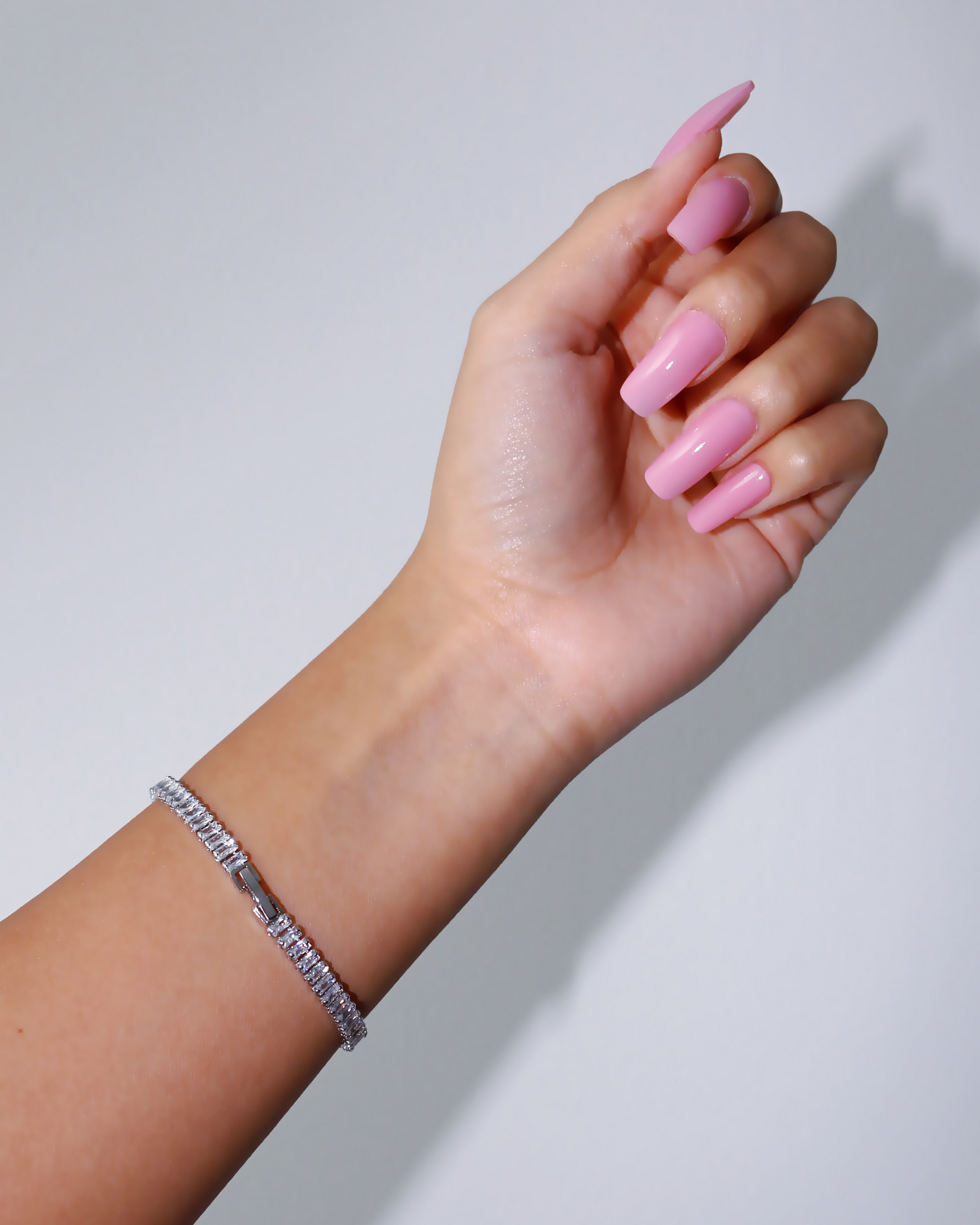 Sterling silver and 18k gold plated Icy Tennis Bracelet by Ultramarine Birch with sparkling gemstones on a delicate chain
