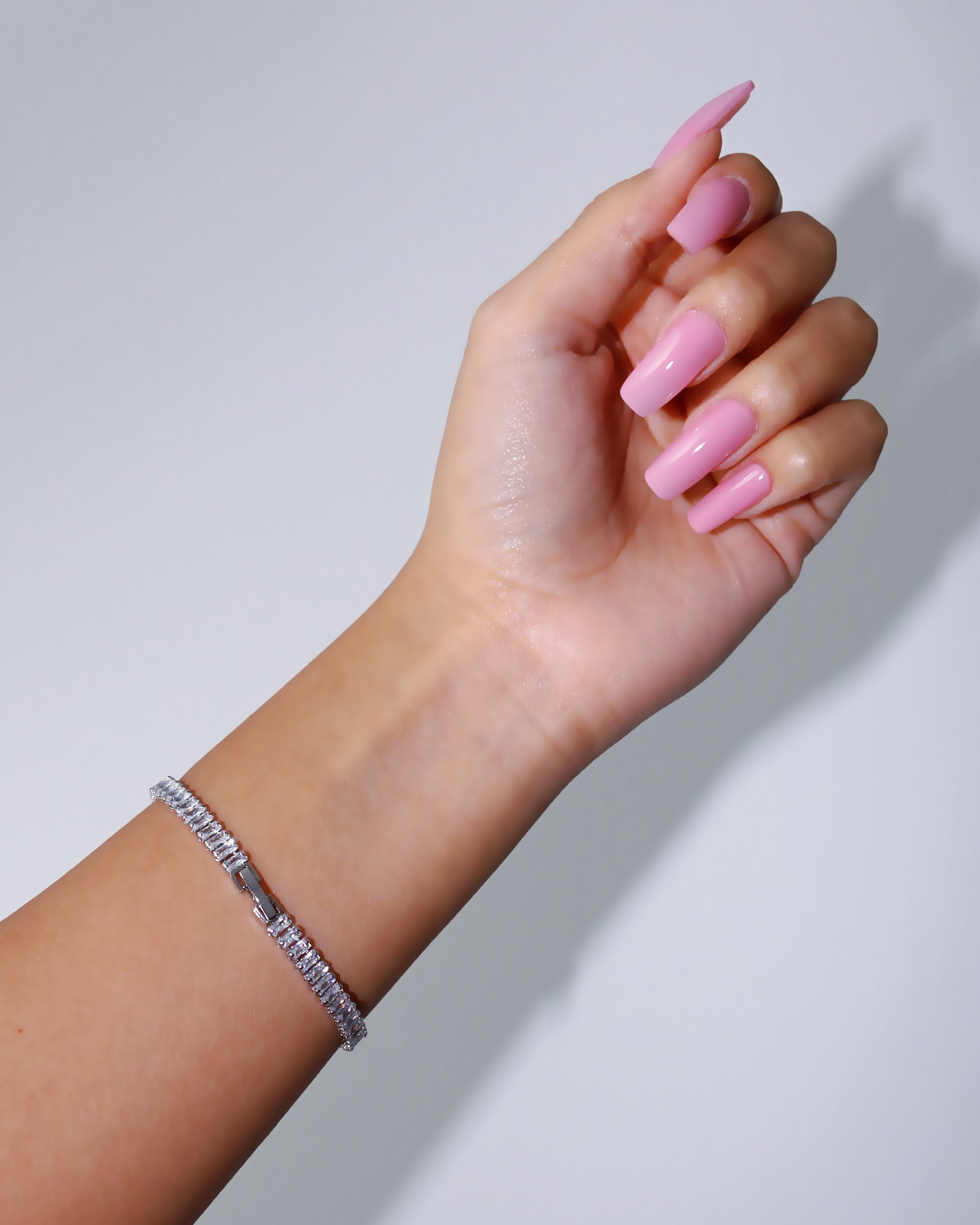 Sterling silver and 18k gold plated Icy Tennis Bracelet by Ultramarine Birch with sparkling gemstones on a delicate chain