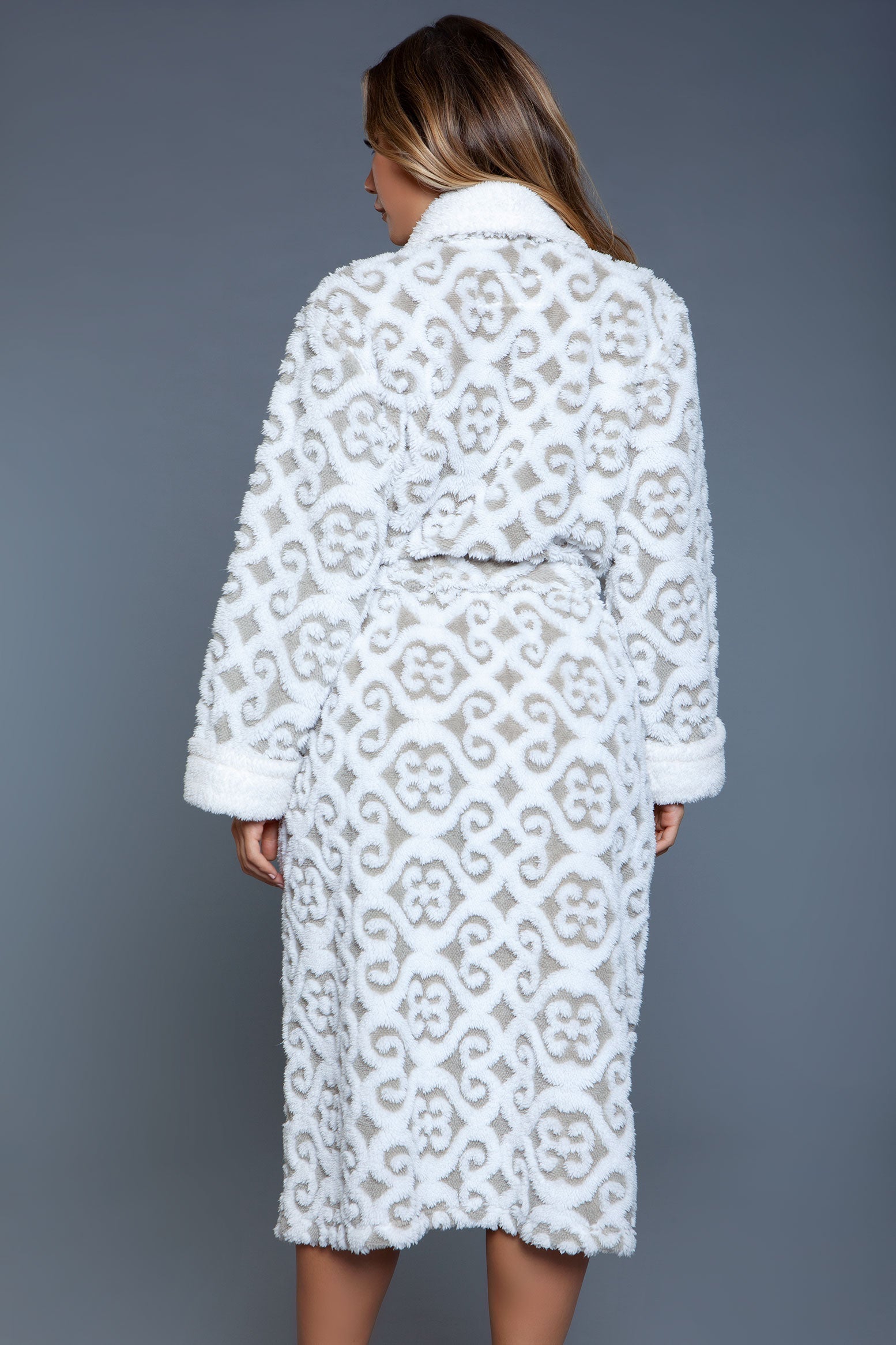 Magenta Caeneus Kimmie Sleepwear Robe in soft fabric, shown folded with a relaxed fit and cozy design for comfortable lounging.