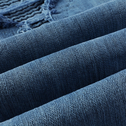Carmine Juneberry UrbanRift™ distressed mid-waist street jeans, showing front view with ripped details and classic denim texture.