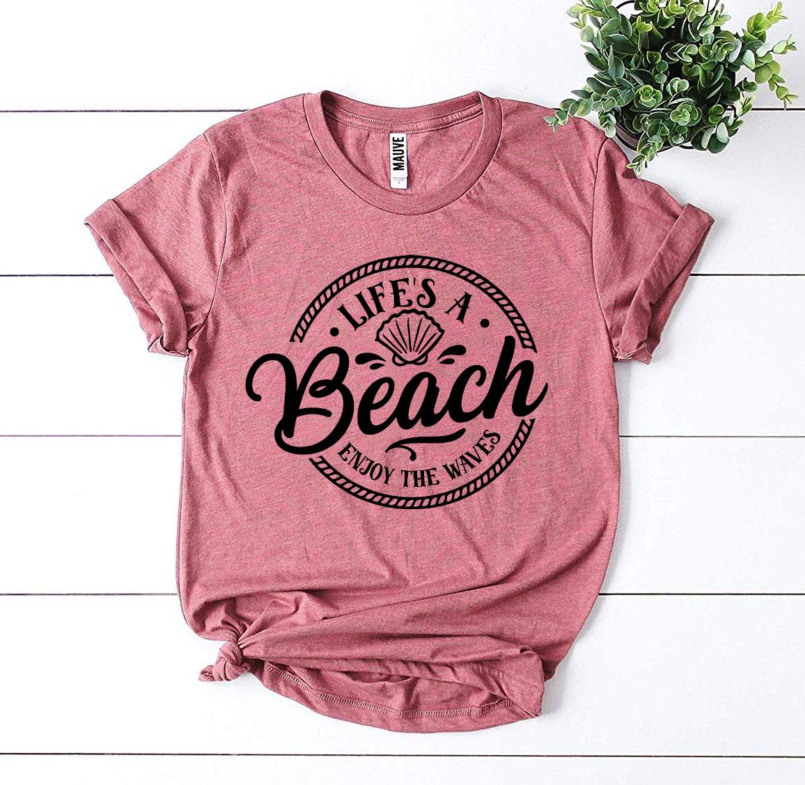 Agate Life’s a Beach Enjoy The Waves T-shirt with ocean wave graphic, casual fit, perfect for beach lovers and summer wear.