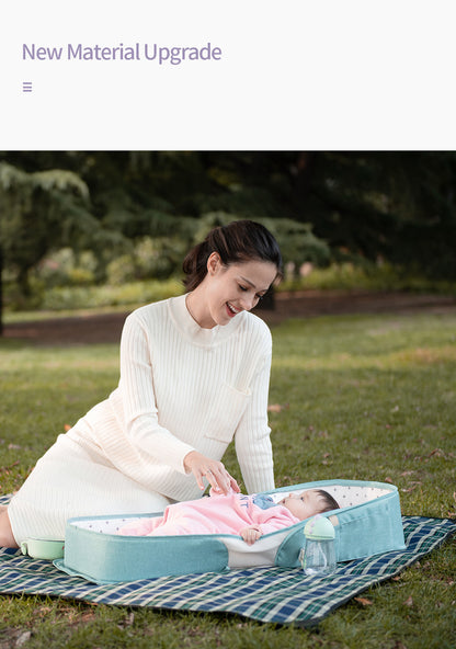 Soft baby portable bed bag by Teal Simba, foldable newborn travel crib with carry-on nest bed for convenient on-the-go comfort.