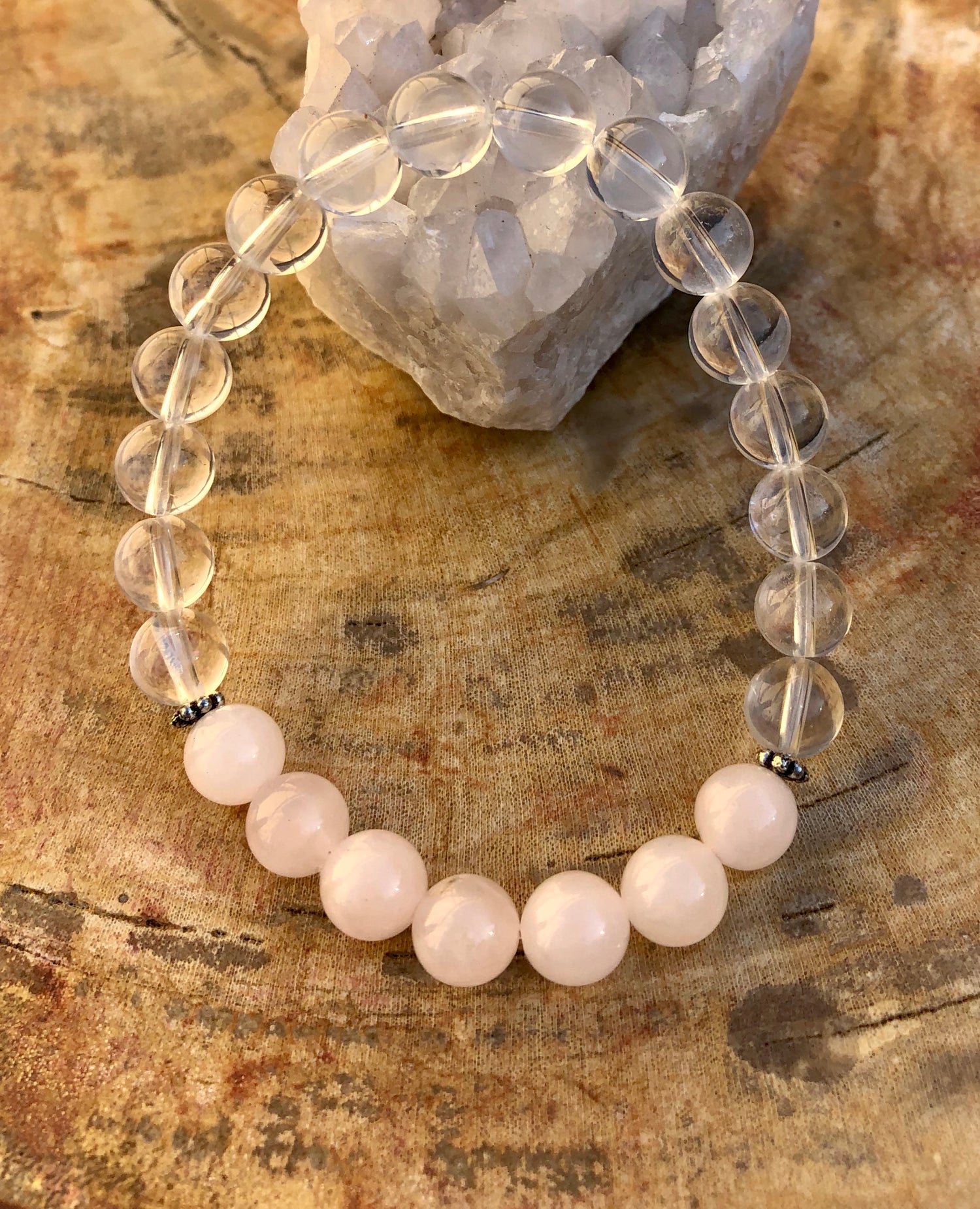 Rose Quartz and Crystal Quartz stretch bracelet featuring genuine gemstones, crafted by Violet Chaos.
