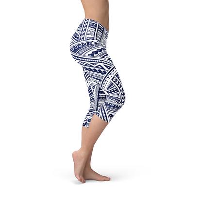 Maroon Sooty Polynesian Maori tattoo design on black Capri leggings, featuring traditional tribal patterns and bold cultural art.