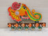 Wooden Ganesha wall hanging with key holder for home decor, featuring intricate design and handcrafted details from Harlequin Hermes.