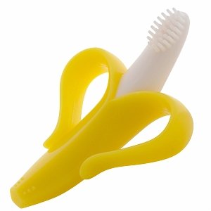 Fuchsia Molly Baby Banana Training Toothbrush as playful home decor with bright yellow banana shape and colorful accents.