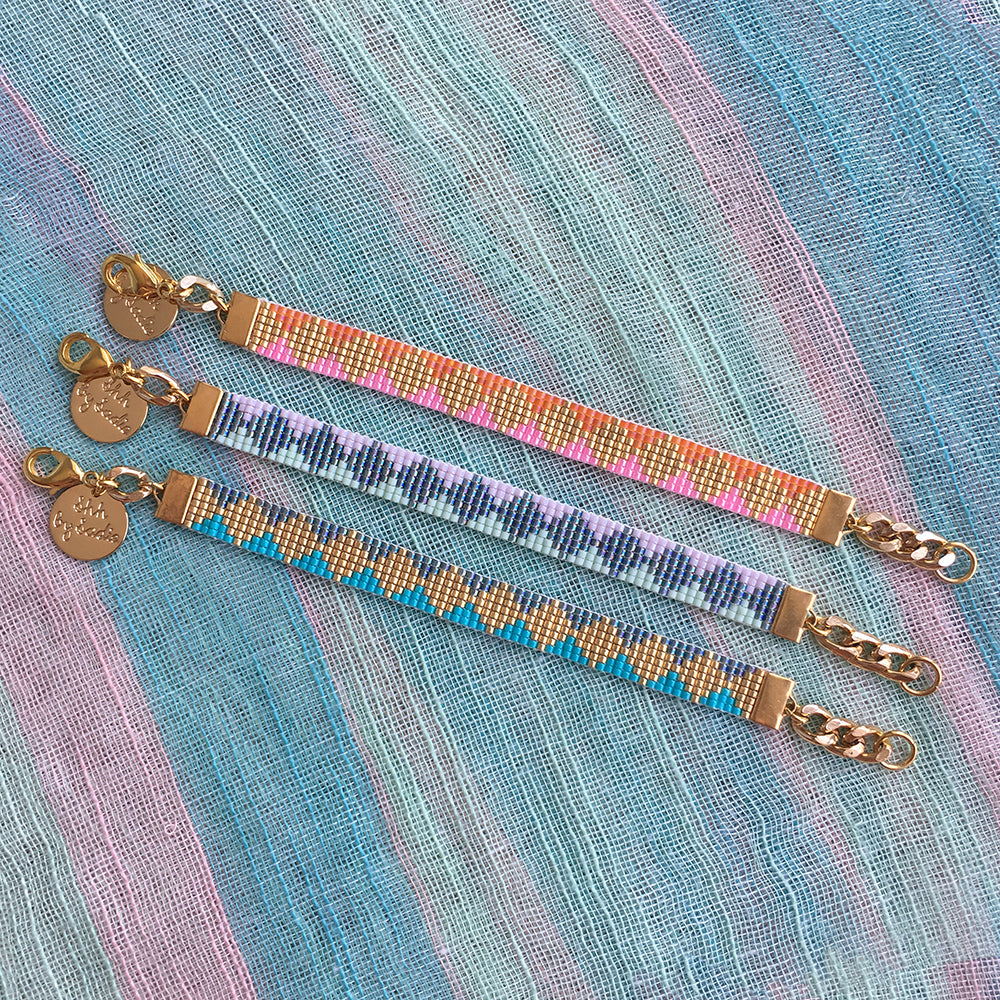 Yellow Athena Skinny Soleil bracelet with yellow, turquoise, and mint beads, featuring a delicate, layered bracelet design.