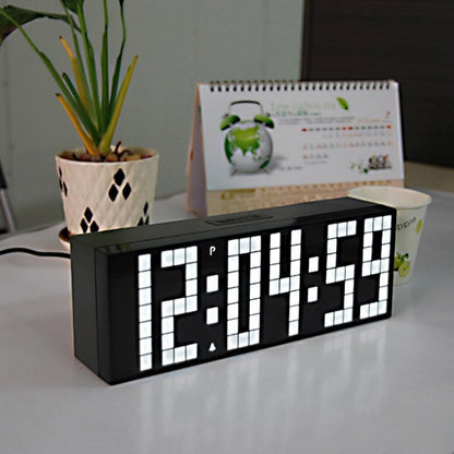 Fuchsia Molly Home LED Digital Clock displaying time on a sleek black background in a home setting
