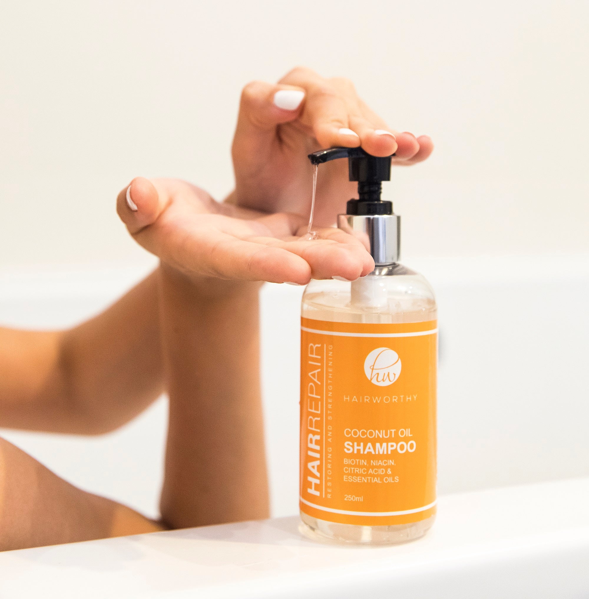 Black Sugarplum Hairworthy Hairrepair Shampoo bottle for damaged hair, featuring a sleek design and vibrant label.