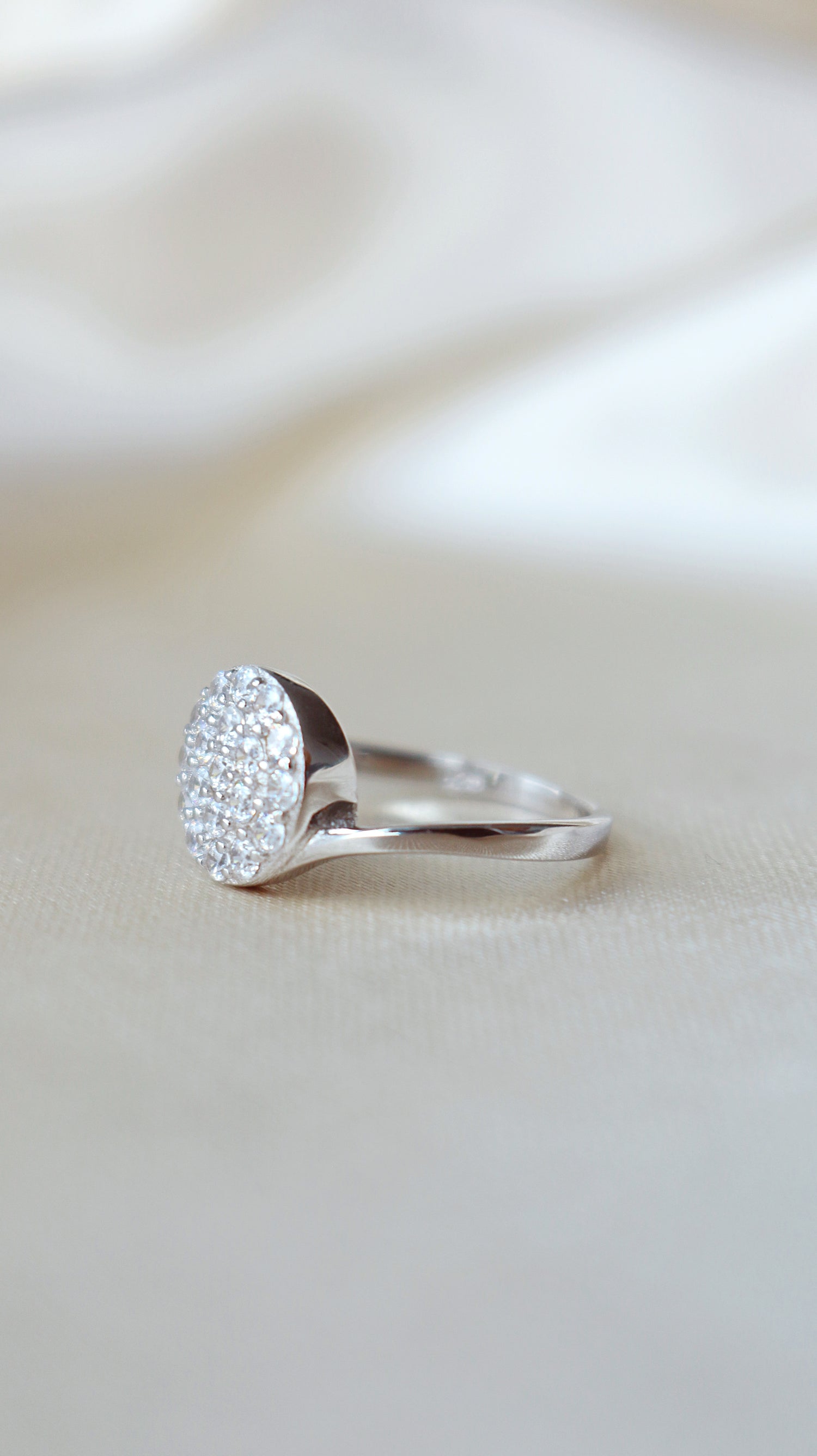 925 silver statement ring with diamond button design from Ultramarine Birch, featuring an intricate, elegant jewelry piece.