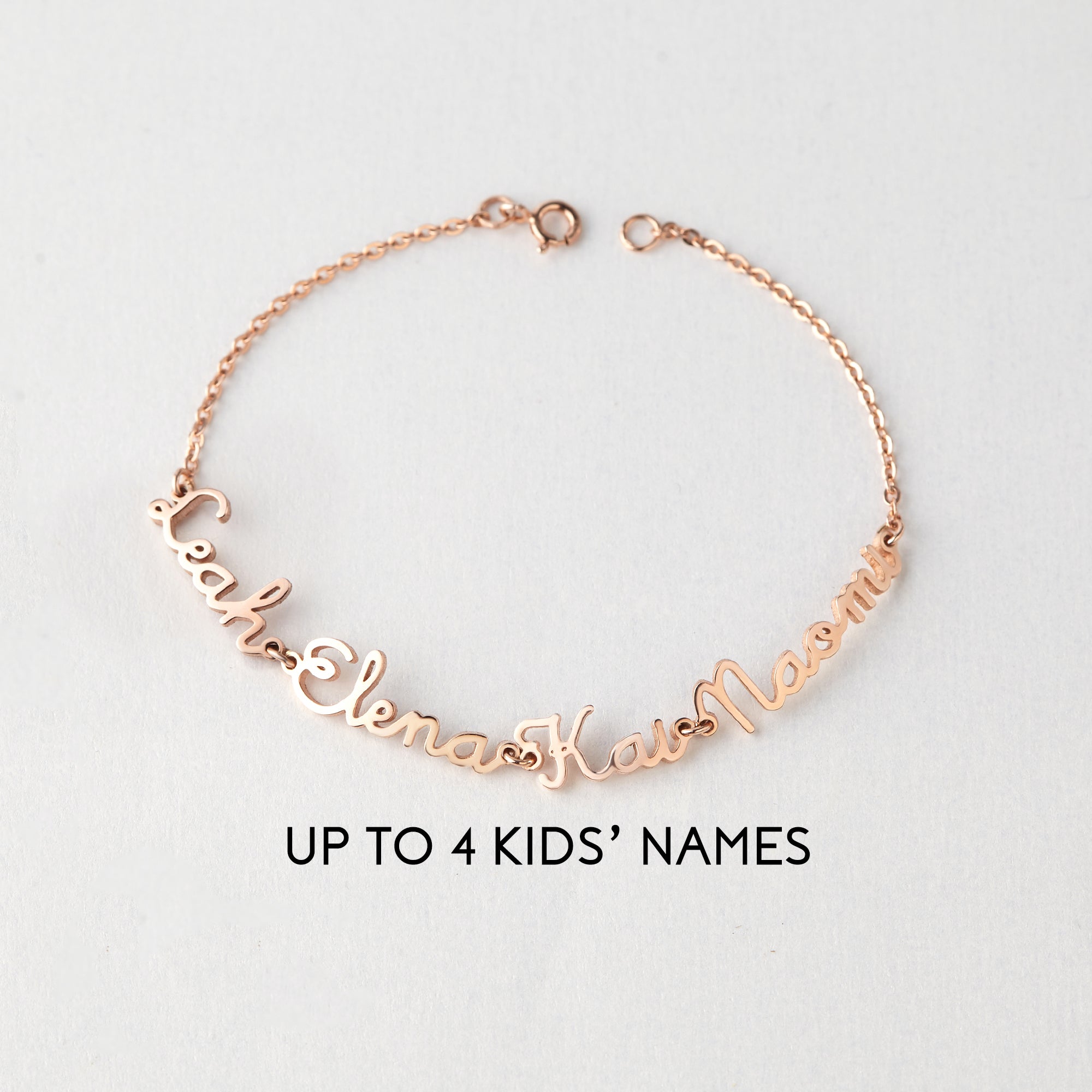Green Millie mom bracelet with multiple engraved kids&