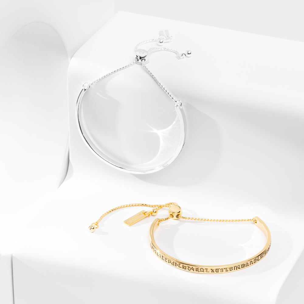 Black Felix Armenian alphabet bracelet featuring engraved Armenian script on a stylish silver bangle.