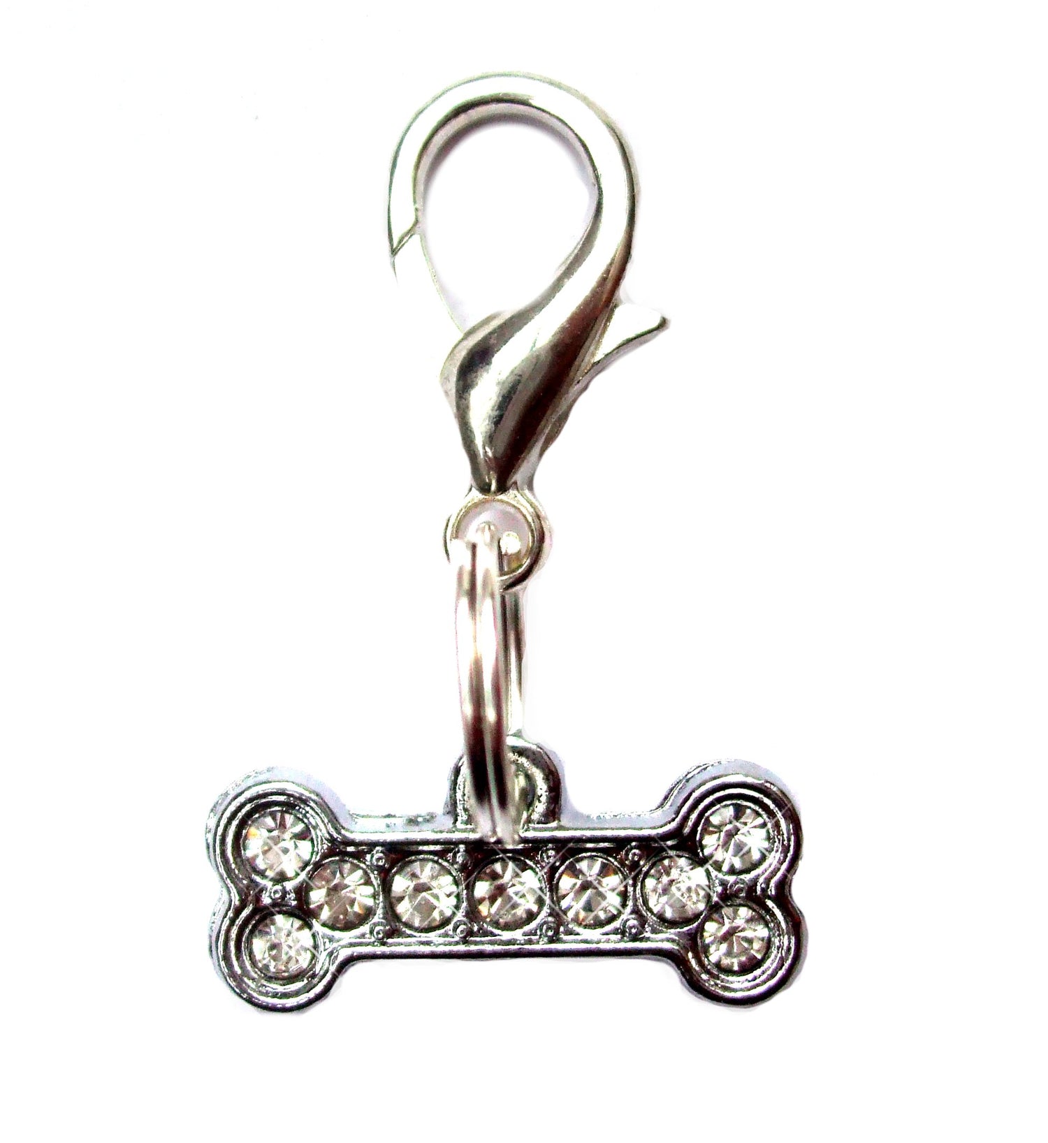 Small bone pendant charm for pet leashes and collars by Salmon Oscar, featuring a cute bone design for pet accessories.