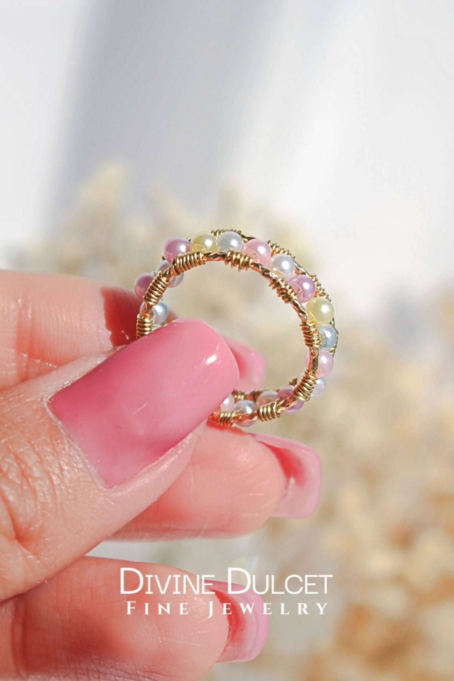 Ultramarine Birch 18K pastel rainbow hand-wired band ring featuring colorful pastel gemstones and intricate wire design.