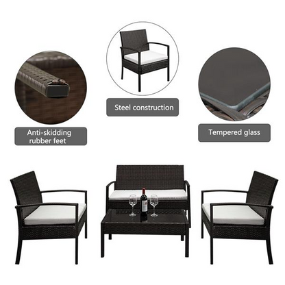 Four-piece rattan patio furniture set by Lilac Milo featuring woven rattan chairs and a matching table for outdoor relaxation.