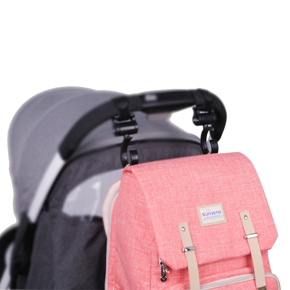 Maroon Chronos canvas diaper bag travel backpack with multiple compartments and adjustable straps, designed for parents on the go.
