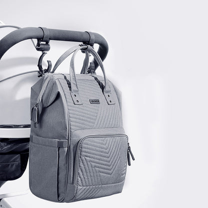 Modern quilted diaper bag backpack by Maroon Chronos, stylish kids and babies accessory with multiple pockets and adjustable straps.