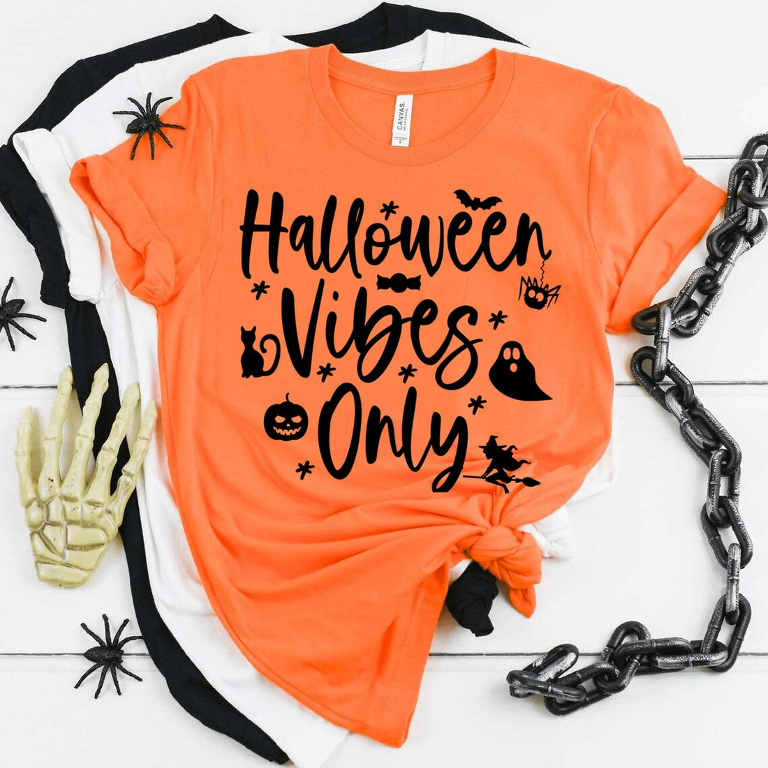 Black Halloween Vibes Only T-shirt by Agate featuring spooky design and festive text, perfect for Halloween celebrations.