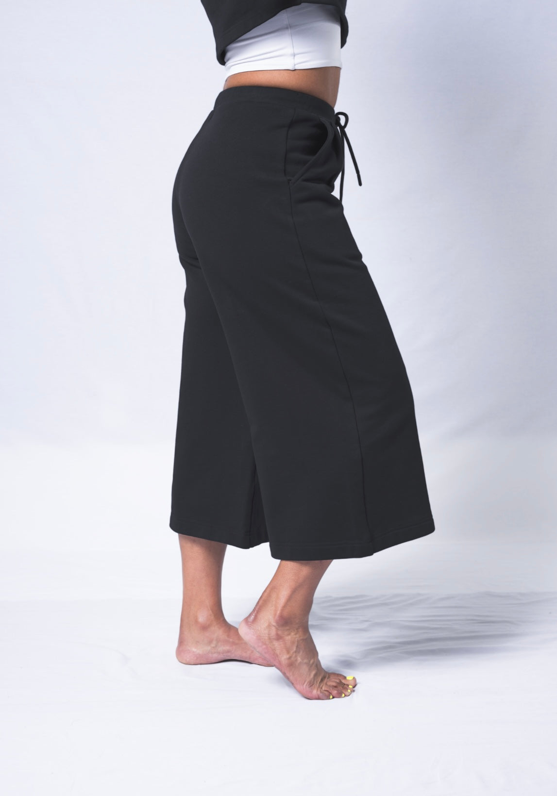 Beige Daisy Colette Pants from matching sets collection, beige fabric with tailored design, front pockets, and high-waisted fit.