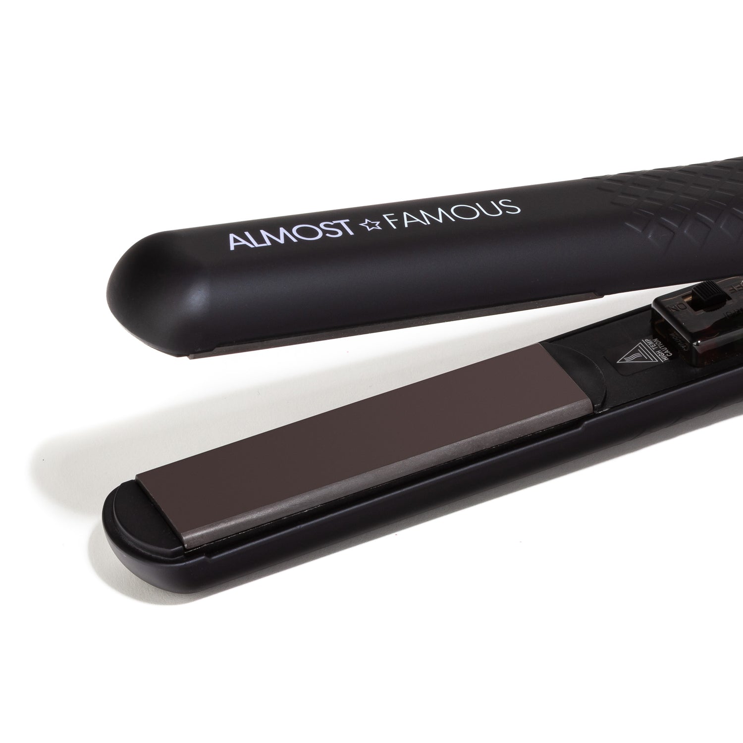 Sky Blue Thrace Almost Famous Venice Babe Flat Iron with Luxe Gem Infused Plates for smooth, sleek hair styling.