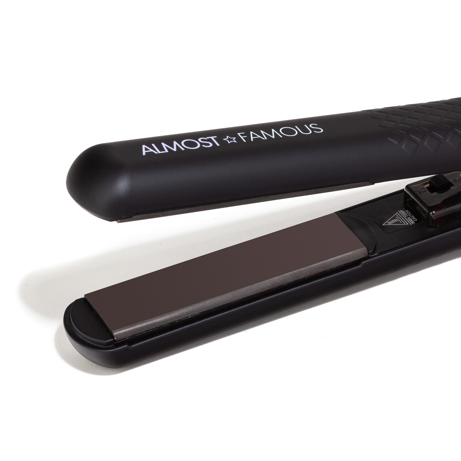 Sky Blue Thrace Almost Famous Venice Babe Flat Iron with Luxe Gem Infused Plates for smooth, sleek hair styling.