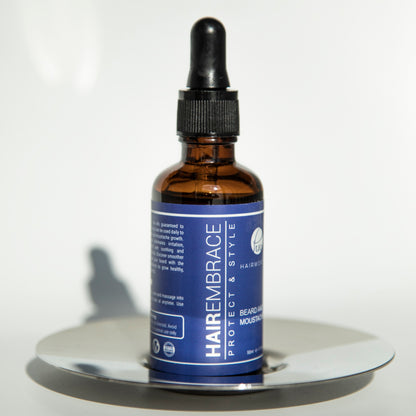 Black Sugarplum Hairworthy Hairembrace Beard Oil bottle, bath and beauty product for nourishing and styling beards.