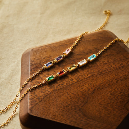 Green Millie mom bracelet featuring colorful birthstones and delicate chain design, perfect for sentimental jewelry.