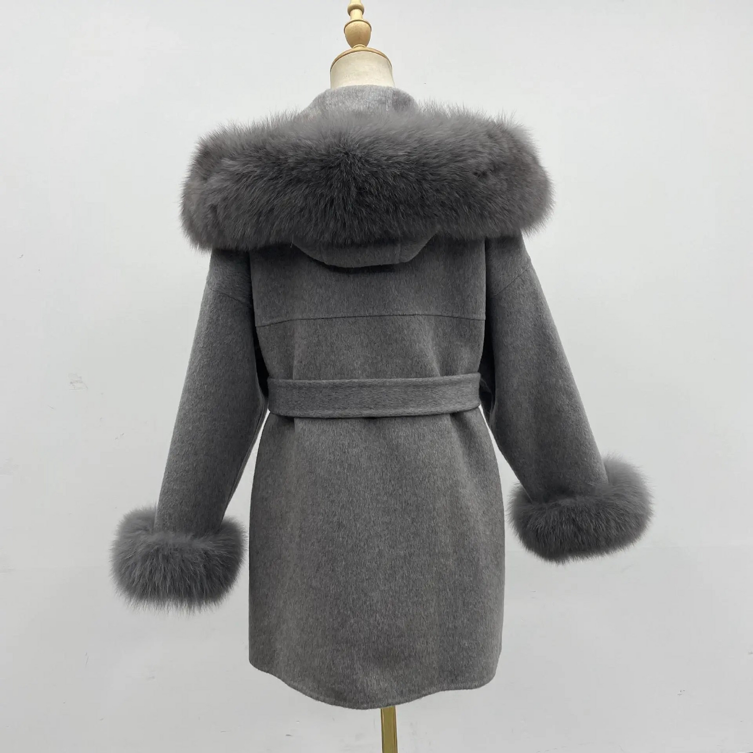 Carmine Juneberry oversized wool coat with hood, double-sided design, and plush fur collar, perfect for luxurious warmth and style.