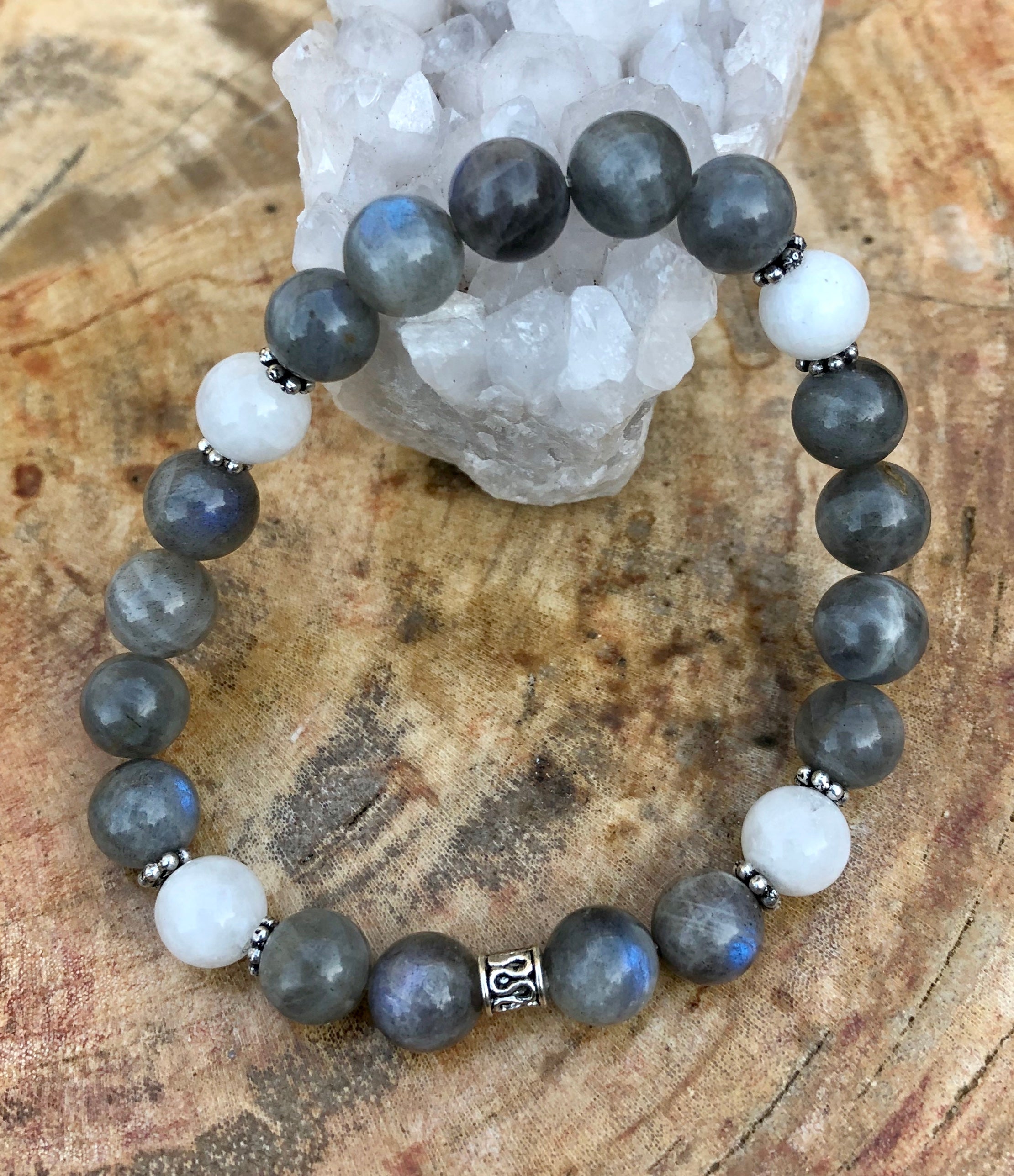 Blue flash Labradorite and rainbow moonstone stretch bracelet by Violet Chaos featuring vibrant, iridescent gemstone beads.