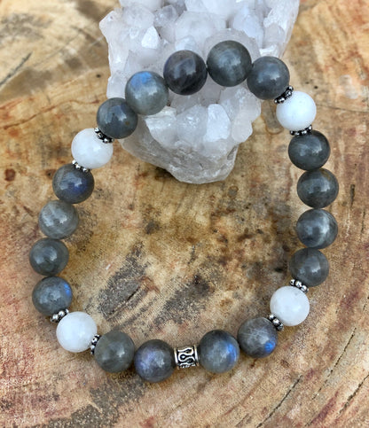 Blue flash Labradorite and rainbow moonstone stretch bracelet by Violet Chaos featuring vibrant, iridescent gemstone beads.