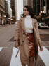 Azure Thanatos Serena double-breasted trench coat for women, shown in beige with classic lapels and belted waist.