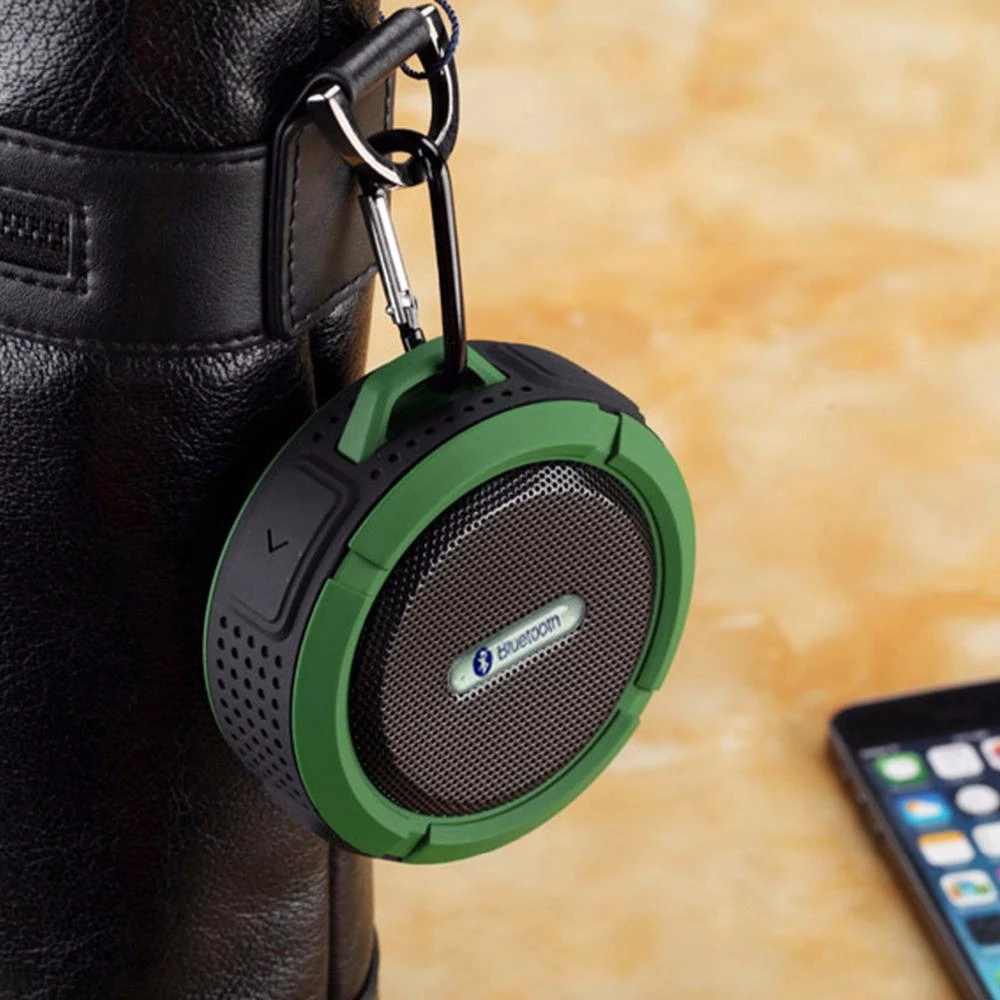 Teal Simba mini portable waterproof Bluetooth speaker with suction cup, compact tech accessory for outdoor and shower use