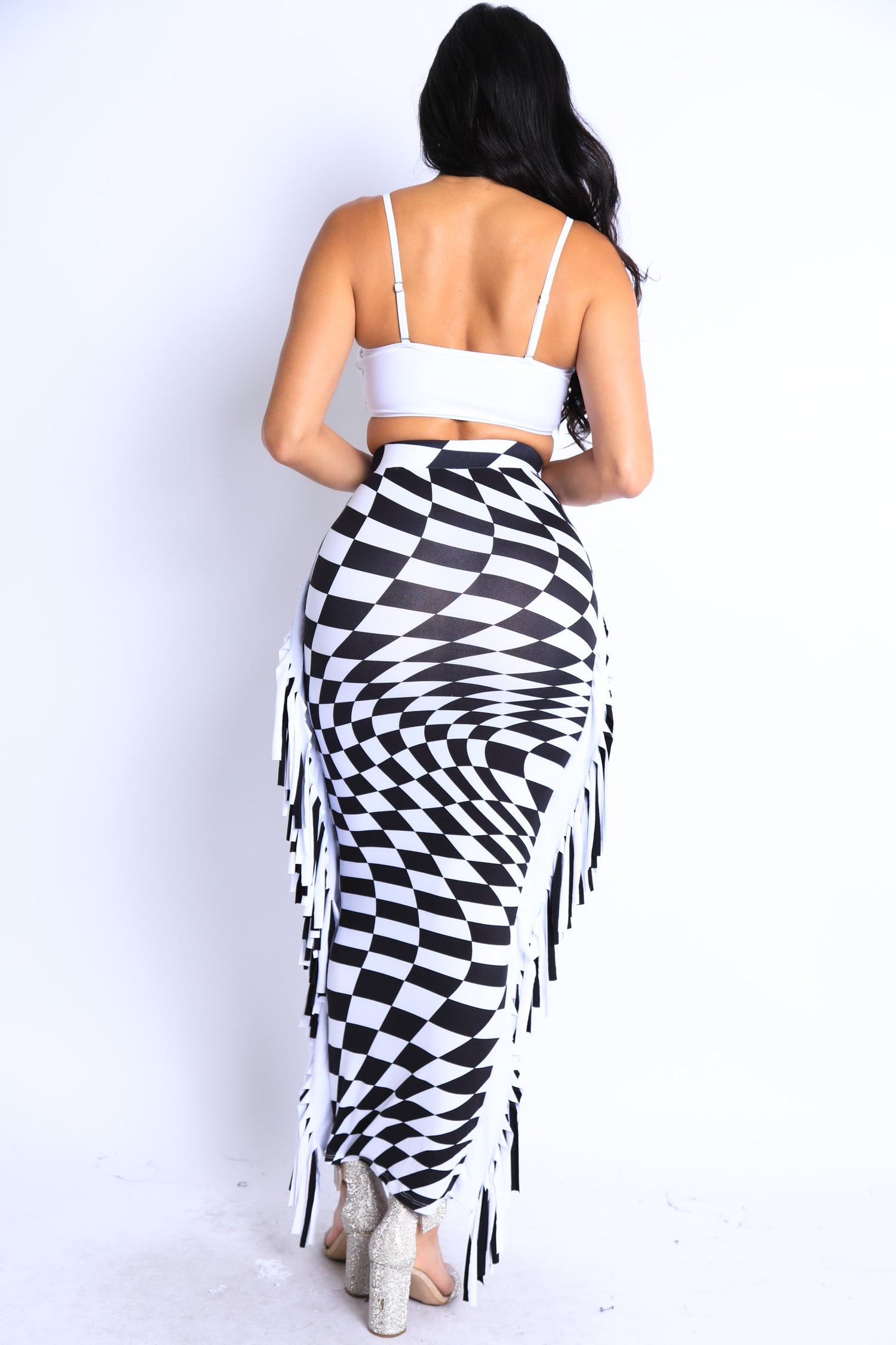 Checkered elastic high waist stretch bodycon maxi pencil skirt by Puce Juniper, featuring a fitted silhouette and checkered pattern.