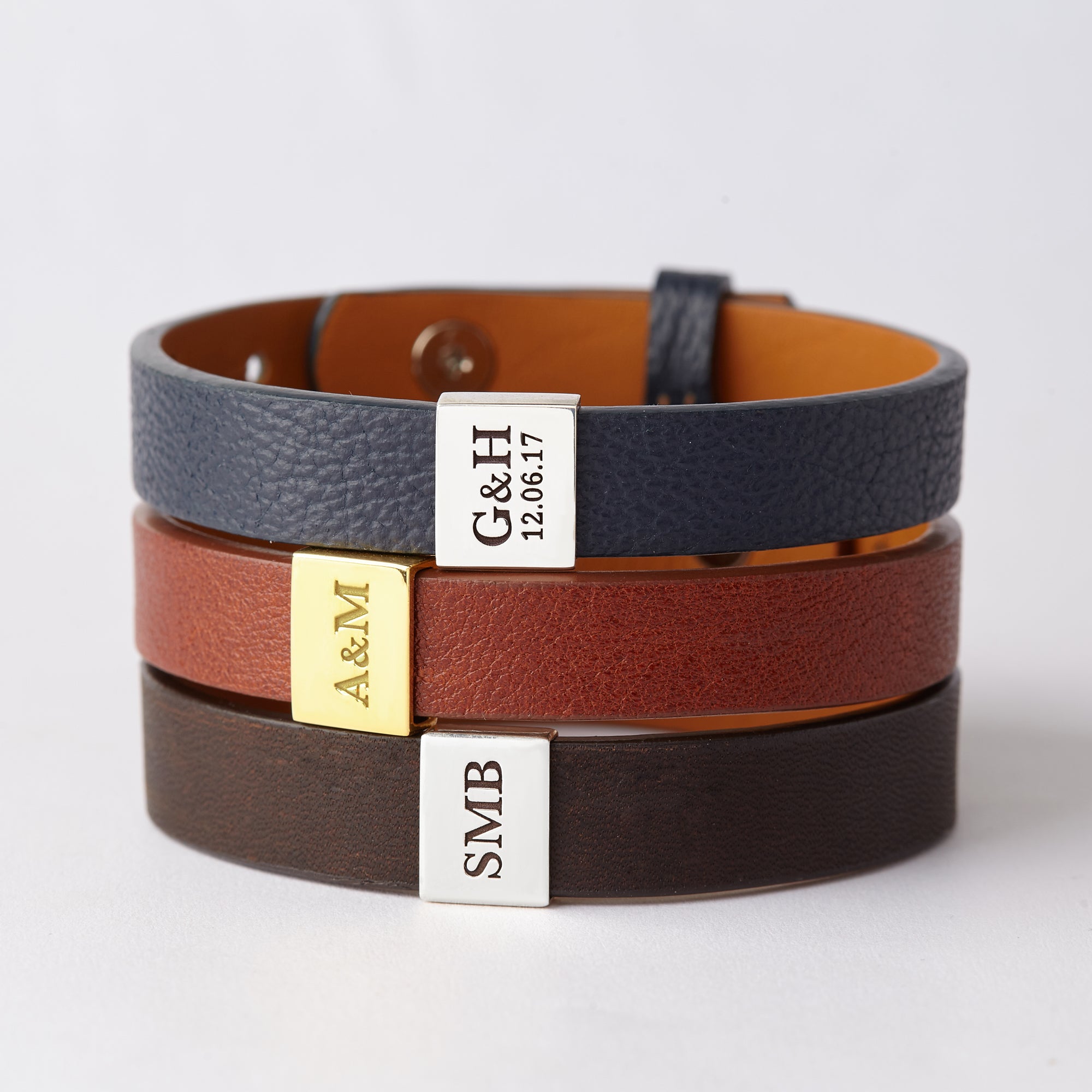 Green Millie custom leather bracelet for men with engraved initials, featuring a sleek leather strap and personalized design.