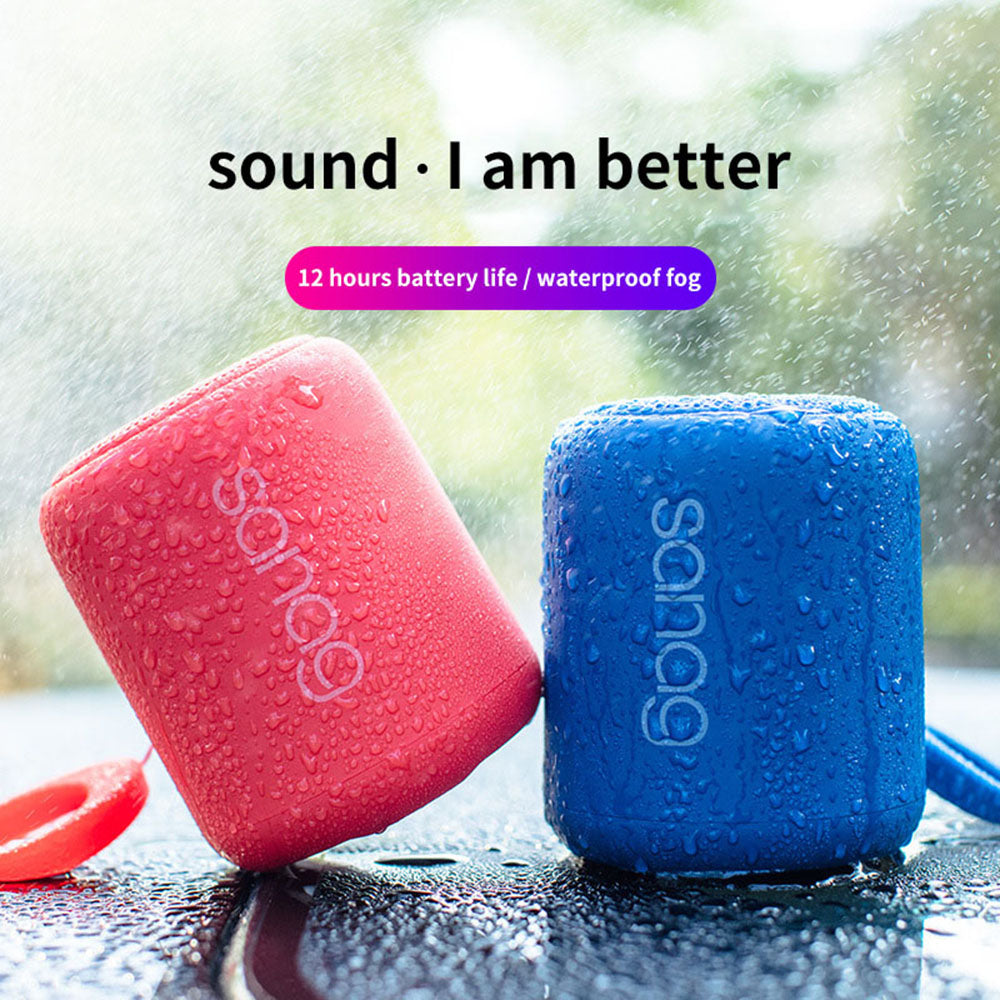 Teal Simba mini portable wireless Bluetooth stereo speakers on a table, compact and sleek design for audio on the go.