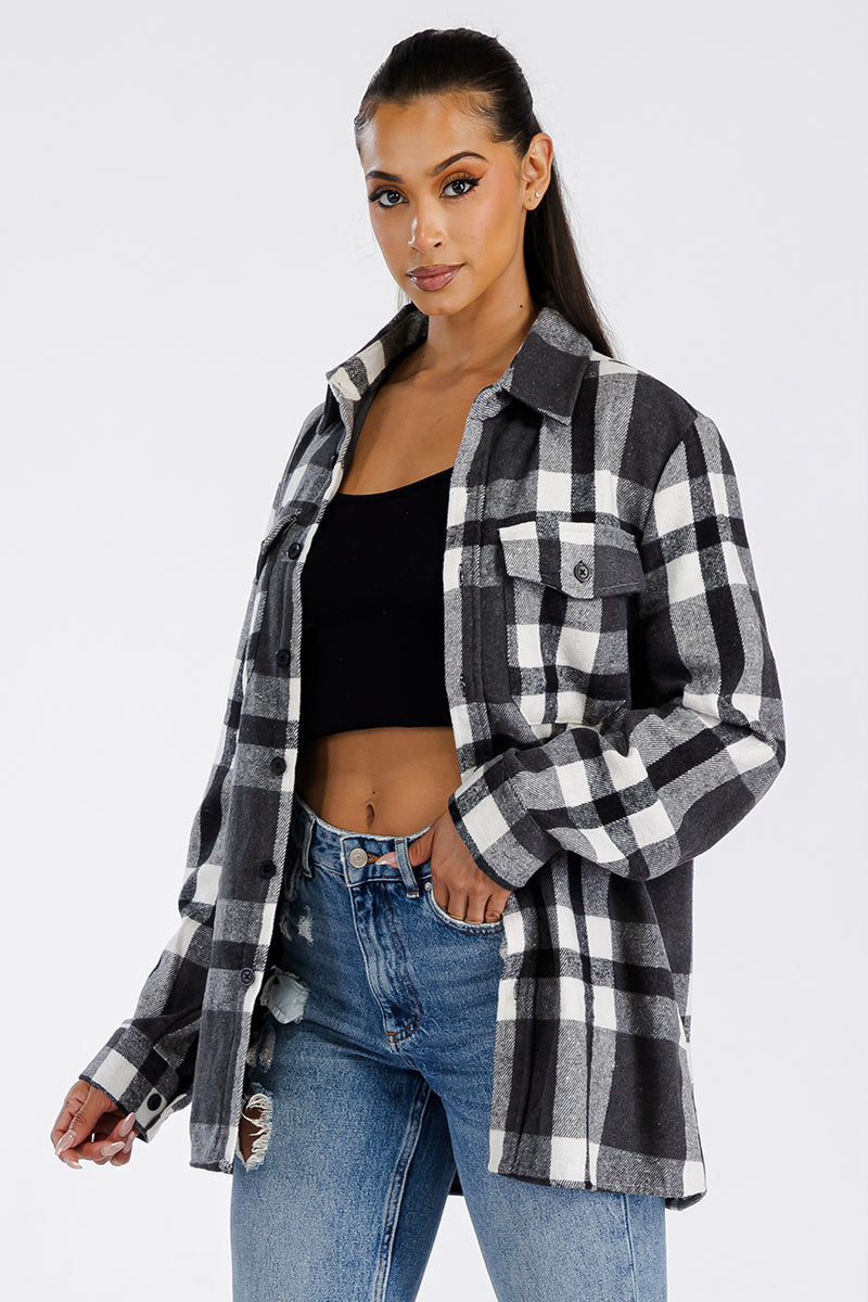 Boyfriend oversized soft flannel shacket by Lime Milo, shown in a cozy, relaxed fit with button closures and plaid pattern.