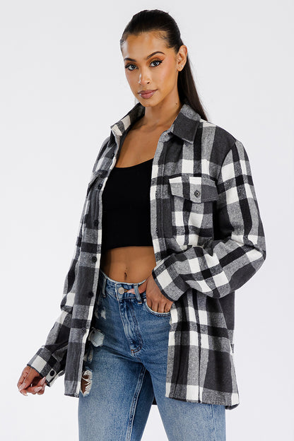 Boyfriend oversized soft flannel shacket by Lime Milo, shown in a cozy, relaxed fit with button closures and plaid pattern.