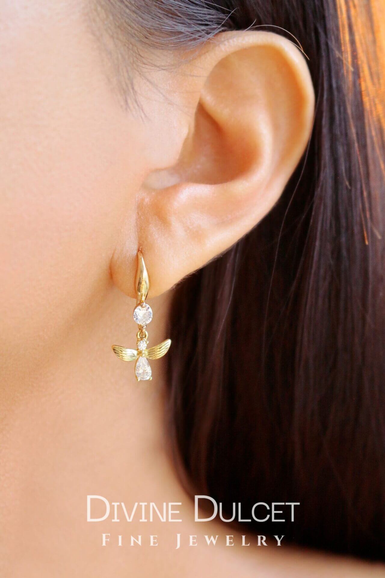 Ultramarine Birch 18 Karat Bee Hook Earrings featuring gold bee design and elegant hook style for pierced ears.