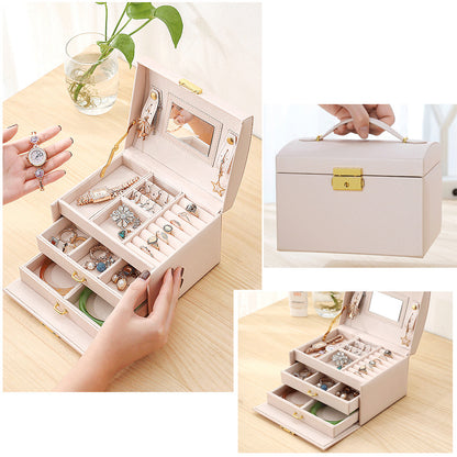 Brown Demeter leather jewelry box for earrings and rings, organized with compartments for elegant storage of jewelry.